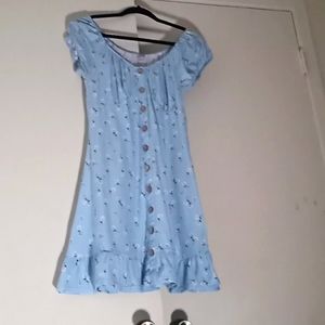 A blue summer dress with Daisey flower print